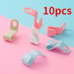 10 tk. uued multifunktsionaalsed riidepuu &uuml;henduskonks, standardsed riidepuud, pikendusklambrid mitmev&auml;rviline