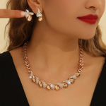 Naiste &otilde;&otilde;nsa mustriga kaelakee ja k&otilde;rvar&otilde;ngaste komplekt kuld