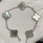 Uus versioon Neljaleheline ristik Viie &otilde;iega k&auml;ev&otilde;ru Naturaalne punane ahhaat Valge p&auml;rlmutter K&auml;ev&otilde;ru Naiste laserk&auml;ev&otilde;ru V Gold