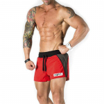 Muscleguys Meeste J&otilde;usaalide l&uuml;hikesed p&uuml;ksid Suvised vabaaja Bermuda Rannap&uuml;ksid Meeste Sportlikud Kulturismi L&uuml;hikesed dressip&uuml;ksid Kuivalt sobivad l&uuml;hikesed p&uuml;ksid Fitnessriietus XL punane