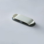 2tk Toitepistikupesa hoidik USB andmekaabli kerija Seinale paigaldatav isekleepuv konks Multifunktsionaalne seinakonks k&otilde;rvaklappide vastuv&otilde;tja