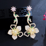 CMM elegantsed kollased kuubikujulised tsirkooosid, pikkade lilledega lehtedest k&otilde;rvar&otilde;ngad kuld