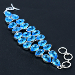 &Scaron;veitsi sinisest topaasist v&auml;&auml;riskivist k&auml;sitsi valmistatud 925 h&otilde;bedast k&auml;ev&otilde;ru, h&otilde;bedast kalliskivist k&auml;ev&otilde;ru, &Scaron;veitsi sinisest topaasist kivist k&auml;ev&otilde;ru, unisexi k&auml;ev&otilde;ru 8