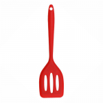 Silikoonist treirid vidinad k&ouml;&ouml;giriistad muna kala praepann k&uuml;hvel praetud labidas spaatliga toiduvalmistamisn&otilde;ud punane