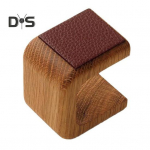 Puidust kellaalus kunstnahast &uuml;lemise kihiga p&otilde;hjamaise stiilis dekoratiivse kaunistusega siledate servadega kellakorder pruun