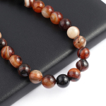 Isoaltion Bead Looduslikust kivist Tume triibuline ahhaat &Uuml;mmargused helmed ehete valmistamiseks DIY kaelakee k&otilde;rvar&otilde;ngad k&auml;ev&otilde;ru tarvik 4mm