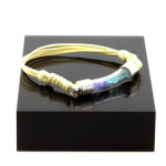 Pierres et Min&eacute;raux. Bracelet Tanzanite + Apatite Paraiba brut. Couleur beige.