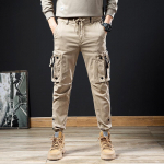 Mitme taskuga v&auml;listingimustes kasutatavad meeste Techwear Tactical Cargo p&uuml;ksid meeste sport vabaaja hip-hopi haaremi p&uuml;ksid t&ouml;&ouml;p&uuml;ksid 5XL roheline