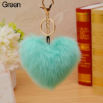 Kunstkarusnahast pall Pompon s&uuml;damekujuline autotelefoni v&otilde;tmehoidja k&auml;ekott v&otilde;tmehoidja roheline