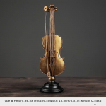 Vaik P&otilde;hjamaade Kodu Kaunistus Elutuba S&ouml;&ouml;gilaud Laud Kuldne Viiul Saksofon