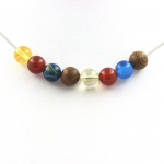 Pierres et Min&eacute;raux. Collier perles bois + Agate Rouge + Agate ruban&eacute;e bleu + Citrine 8 mm Chaine en acier inoxydable.