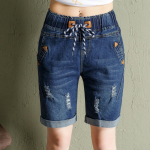 Suured t&uuml;drukute teksap&uuml;ksid vedruelastsed k&otilde;rge v&ouml;&ouml;kohaga lahtised rebitud viienda laia s&auml;&auml;rega p&uuml;ksid 34 tumesinine v&auml;rv