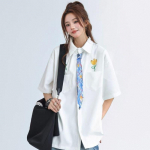 Lilledega grafiti mustriga naiste s&auml;rgid suvised l&uuml;hikeste varrukatega &uuml;he n&ouml;&ouml;biga valged pluusid vaba l&otilde;ikega rev&auml;&auml;ridega taskuga topid XXL