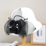 S&uuml;gis- ja talve villane silinder naiste Briti mood soe &auml;mbrim&uuml;ts elegantse lillega viltk&uuml;bar Adjustable