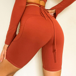 &Otilde;mblusteta booty joogap&uuml;ksid Push Up Amplify l&uuml;hikesed p&uuml;ksid Naiste j&otilde;usaali s&auml;&auml;rised soonikuga k&otilde;rge v&ouml;&ouml;kohaga jalgratturi treeningu fitnessp&uuml;ksid S oranž