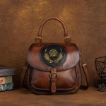 Lilledega reljeefsed &otilde;lakotid naistele Vintage Design seljakotid Ehtsast nahast k&auml;ekotid Naiste moekott 20*9*21cm pruun