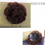 S&uuml;nteetilised updosid lokkis t&uuml;kid Chignon klamber juuksekukli peal Juuste pikendusklamber juuksepaelad hall bromn retro stiilis