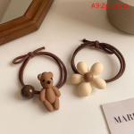 V&auml;rvilised juuksekarvakesed karamelliv&auml;rvilised vibukaru helmed lilled juuksen&ouml;&ouml;r