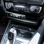 Auto keskkonsooli CD-paneeli asenduspandla hoiukast BMW 3 4-seeria F30 3GT F34 F36 2013-19 auto interj&ouml;&ouml;ri jaoks Console Storage Box