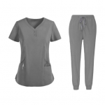 2tk/komplekt Unisex haiglavormikomplekt V-kaelusega l&uuml;hikeste varrukatega taskud Topid Elastsed v&ouml;&ouml;p&uuml;kste komplekt Kiirelt kuivav haigla hambaravi koorimine vormiriietus M sinine
