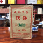 Anhua Baishaxi tume tee kuldlillega tume tee Fu Cha Fu telliskivi 300g HEI CHA