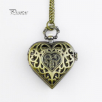 Naiste vintage &otilde;&otilde;nes s&uuml;damekujuline ripats, pika ketiga kaelakee, armas taskukell pronksi