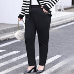 Naiste elastsed vabaajap&uuml;ksid plusssuuruses k&otilde;rge v&ouml;&ouml;kohaga &otilde;hukesed keskealised p&uuml;ksid XL must