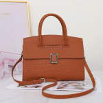 Lehmnahast naiste kott &Uuml;he &otilde;la &uuml;le keha kantav mitmek&uuml;lgne naiste kott Moodne mitme sahtliga suure mahutavusega praktiline kott Krokodillinahast muster