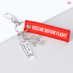 Lennu v&otilde;tmehoidja komplekt, suudlus enne lennukimeeskonna ohutut metalli nikerdamist