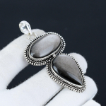 H&otilde;bedase l&auml;ikega obsidiaan v&auml;&auml;riskivi k&auml;sitsi valmistatud 925 sterlingh&otilde;be ehted ripats, topeltkiviga ripats, p&uuml;hadekingis talle ehted erilisteks s&uuml;ndmusteks 2.75" must/h&otilde;be