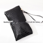 Must krokodillimustriga unisex siduriga rahakott &ndash; moodne ja kompaktne must