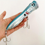 NORVIA Hiiglaslik Popper Pealvee Meelituss&ouml;&ouml;t - 7,28 tolli/106 g Tugevdatud Mereveekalastuseks N&auml;eb V&auml;lja Realistlik Poppiv / Plug - Pikk Heitlus Ahvena P&uuml;&uuml;giks 18.5cm 106g sinine