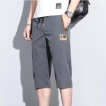 Meeste moep&uuml;ksid Kerged puuvillased stret&scaron;p&uuml;ksid taskutega &uuml;hev&auml;rvilised k&auml;rbitud p&uuml;ksid Meeste kontori suursuuruses M must