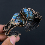 Labradoriit v&auml;&auml;riskivist puhtast vasest traati m&auml;hitud k&auml;sitsi valmistatud manseti/k&auml;ev&otilde;ru ehted uusaastakingituseks Adjustable sinine