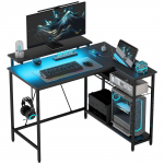 L-kujuline lauaarvuti LED-valgustuse, pistikupesade, USB-portide ja riiuliga, p&ouml;&ouml;ratav, 107 x 80 x 90 cm, Must 107 x 80 x 90 cm must