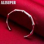 925 sterlingh&otilde;bedast bambusest liigendiga avatava manseti k&auml;ev&otilde;ru ehted