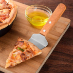 1 tk roostevabast terasest koogik&uuml;hvli nuga pirukas pitsa juustuserver koogijagaja noad koogilabidas puidust k&auml;epidemega k&uuml;psetust&ouml;&ouml;riistad