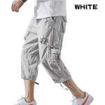 Suvised meeste vabaaja l&uuml;hikesed p&uuml;ksid, 3/4 lahtised p&otilde;lve all olevad Capri p&uuml;ksid 40 hall