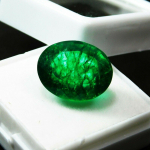 Naturaalne roheline Colombia smaragd 10,2 ct ovaalse l&otilde;ikega sertifitseeritud lahtine v&auml;&auml;riskivi 13 mm approx. roheline