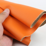 Esimene kiht veisenahk, oranž-kollane naturaalne nahk, 1,3 mm paks, oranži lit&scaron;i mustriga pehme diivani kate, autokatte kate 20x30cm oranž