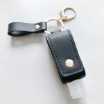 K&auml;te desinfitseerimisvedelik, korduvt&auml;idetav reisipudeli v&otilde;tmehoidja One Size valge