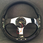 13-tolline Cool Coupe sportauto v&otilde;idus&otilde;idu rool poolringikujulise labaga, 14-tolline