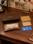 Gucci pruunist nahast k&otilde;va korpusega p&auml;ikeseprillide karp kuldse logoga pruun