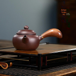K&auml;sit&ouml;&ouml;na valminud Yixing Purple Clay teekannu komplekt &ndash; Tangyu antiikstiilis k&uuml;lgk&auml;epidemega koduseks kasutamiseks ja otse&uuml;lekanneteks. Tangyu Teapot Antique Style/Purple Clay