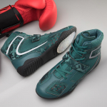 35-46 noorte suured poksisaapad &Uuml;limalt kerged hingavad professionaalsed v&otilde;istlustreeningud Taekwondo saapad Meeste mootorrattasaapad 35