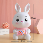 Multikas hoiup&otilde;rsad lapsed j&auml;nku s&auml;&auml;stev j&auml;nes rahakast liik sularahapurk lihav&otilde;ttep&uuml;hade loom kujuke t&uuml;druk lastele s&auml;&auml;stum&auml;nguasi kingitus