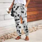 Naiste 3D valge lillefragmentide mustriga p&uuml;ksid paeltega elastse v&ouml;&ouml;kohaga, lahtised p&uuml;ksid, vabaaja pikad p&uuml;ksid taskutega XS valge