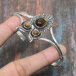 Tiger Eye kalliskivist k&auml;sitsi valmistatud 925 h&otilde;bedane reguleeritav k&auml;ev&otilde;ru naistele Adjustable kollane