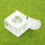 Akr&uuml;&uuml;lsipelgate tegevusala katseklaasi &uuml;henduspesa isetehtud sipelgafarmi s&ouml;&ouml;dakast