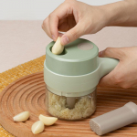 K&auml;eshoitav elektriline k&ouml;&ouml;giviljaviilutaja Juhtmeta t&ouml;&ouml;v&otilde;imeline elektriline k&uuml;&uuml;slaugul&otilde;ikur Purustushakklihamasin First Generation roheline